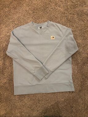 The North Face women’s light blue crew neck sweatshirt